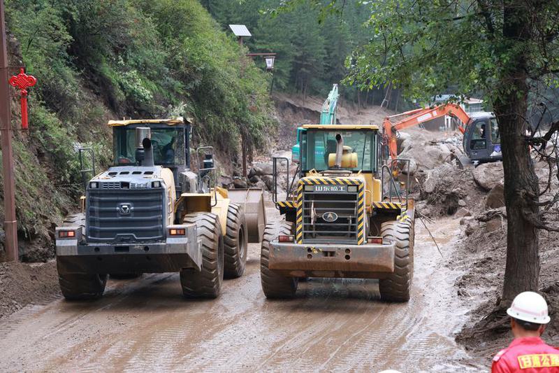 CHINA-GANSU-TORRENTES DE MONTAÑA-ESFUERZOS DE RESCATE