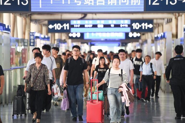 #CHINA-CROSS-REGIONAL PASSENGER TRIPS-HOLIDAY TRAVEL SURGE (CN)
